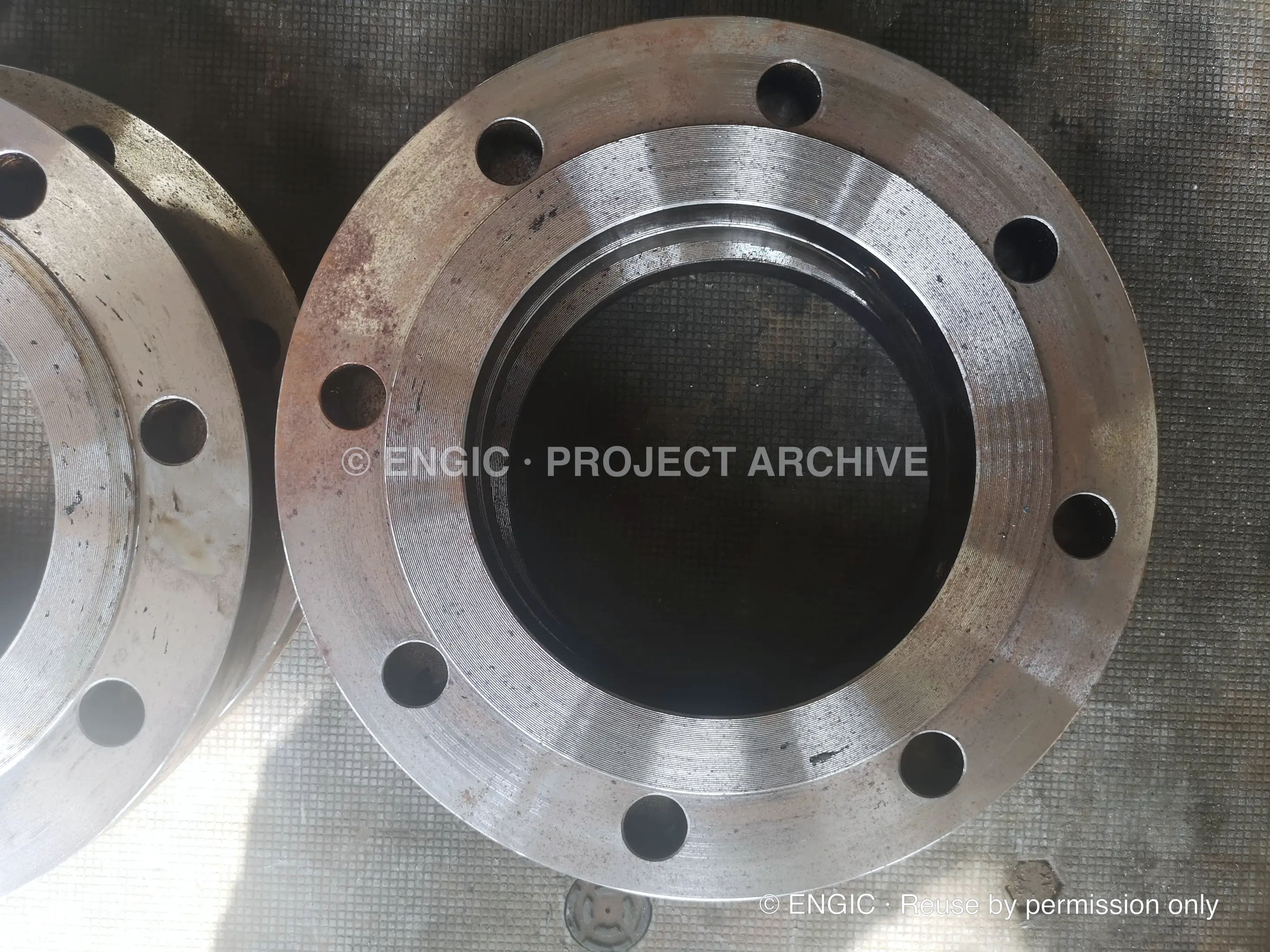 The machined sealing face of a large steel flange
