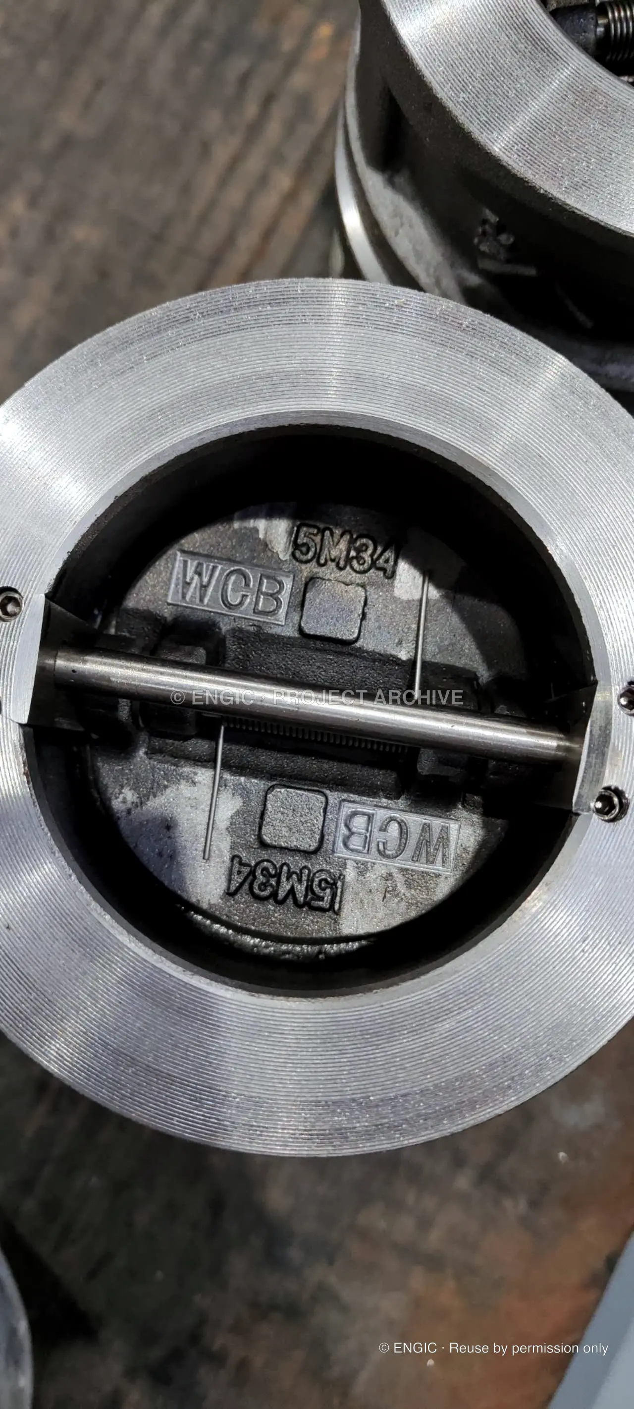 Sourced industrial check valves photographed for the project archive