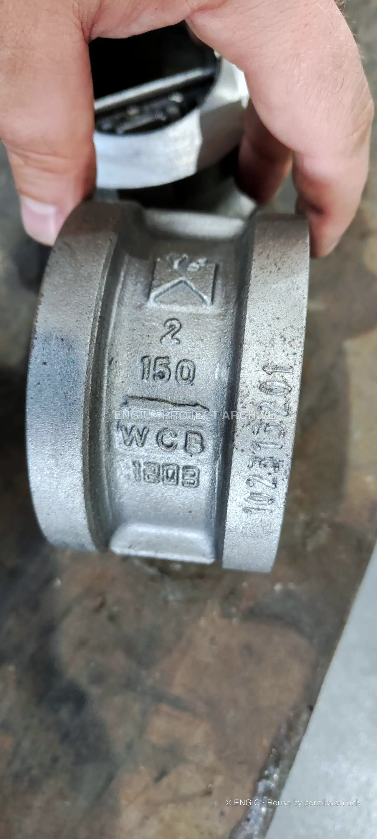 Sourced industrial check valves photographed for the project archive